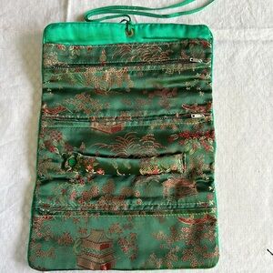 Oriental jewelry roll in green and burnt red travel for jewelry organization euc
